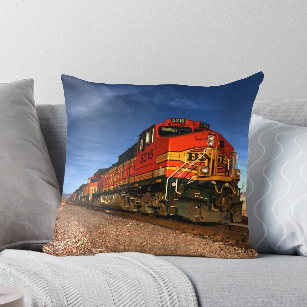 Colorful Santa Fe-style pillow featuring an illustration of a classic American freight train