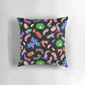 Colorful rainbow nudibranchs (sea slugs) printed on a throw pillow for vibrant marine-themed home decor.