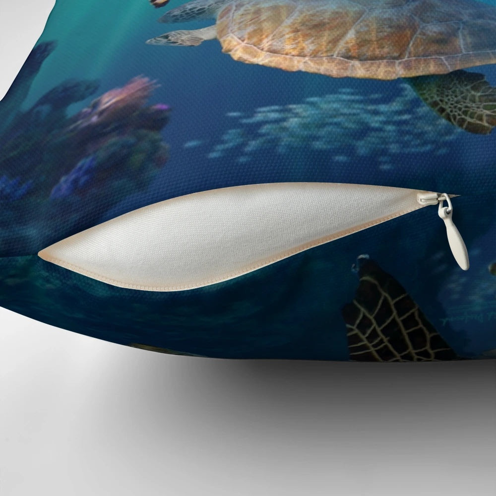 Colorful sea turtle pillow featuring an underwater scene with coral and marine life