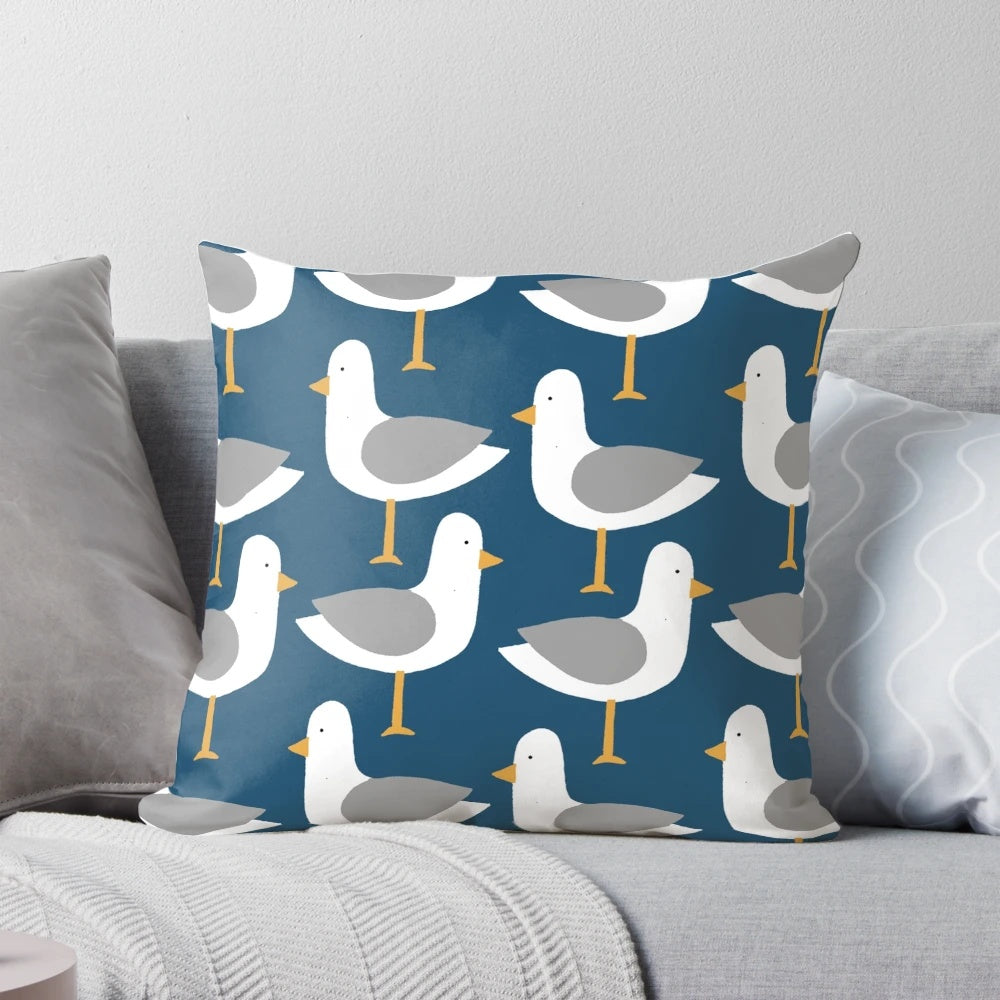 Colorful seagull pattern decorative pillow in shades of blue, green, pink, and orange