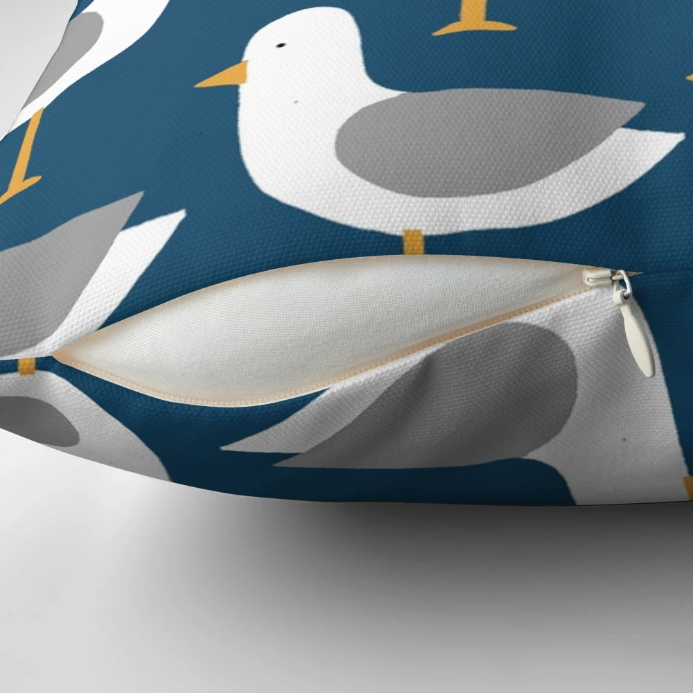 Colorful seagull pattern decorative pillow in shades of blue, green, pink, and orange