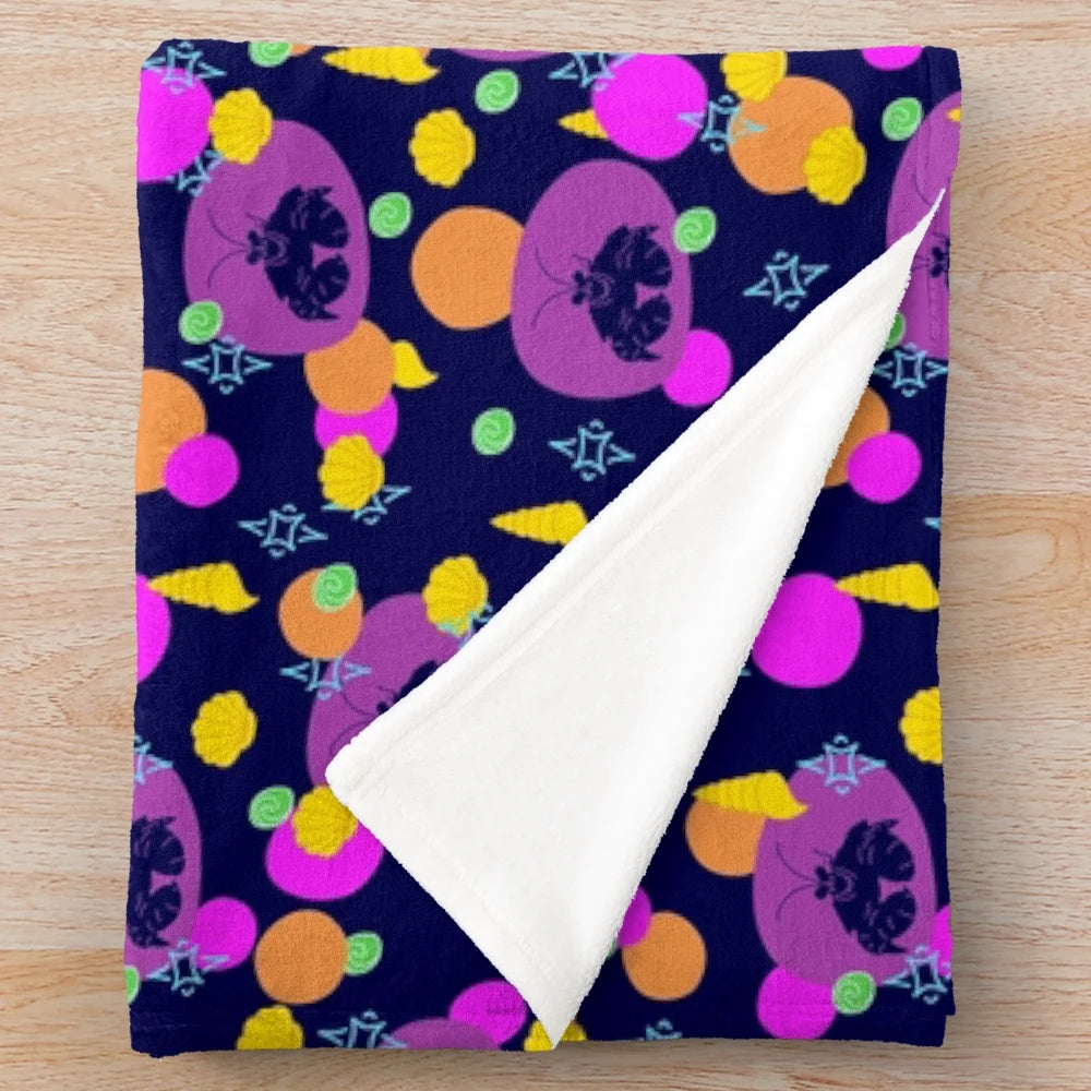 Shiny plush blanket with tropical marine pattern