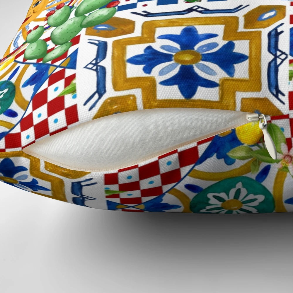 Colorful mosaic pillow with Sicilian tile pattern, lemons, and baroque leaf design