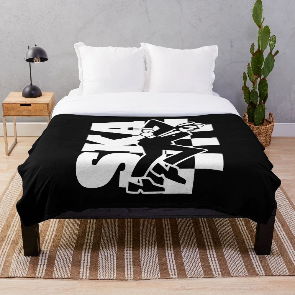 Colorful plush blanket with ska-inspired design