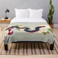 Snake and floral print plush blanket