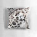 Colorful abstract design featuring a snow leopard print on a decorative throw pillow