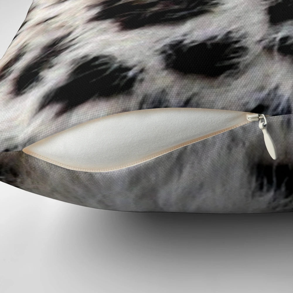 Colorful abstract design featuring a snow leopard print on a decorative throw pillow