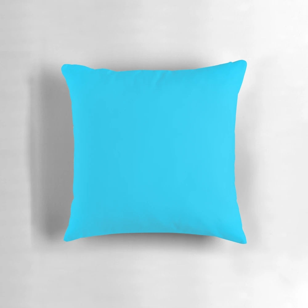 Solid blue decorative pillow with vivid, vibrant coloring