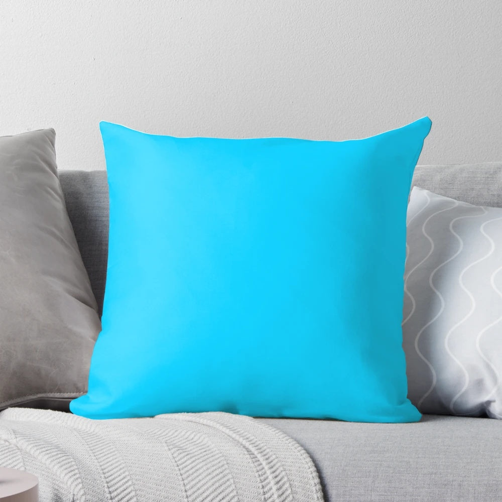 Solid blue decorative pillow with vivid, vibrant coloring