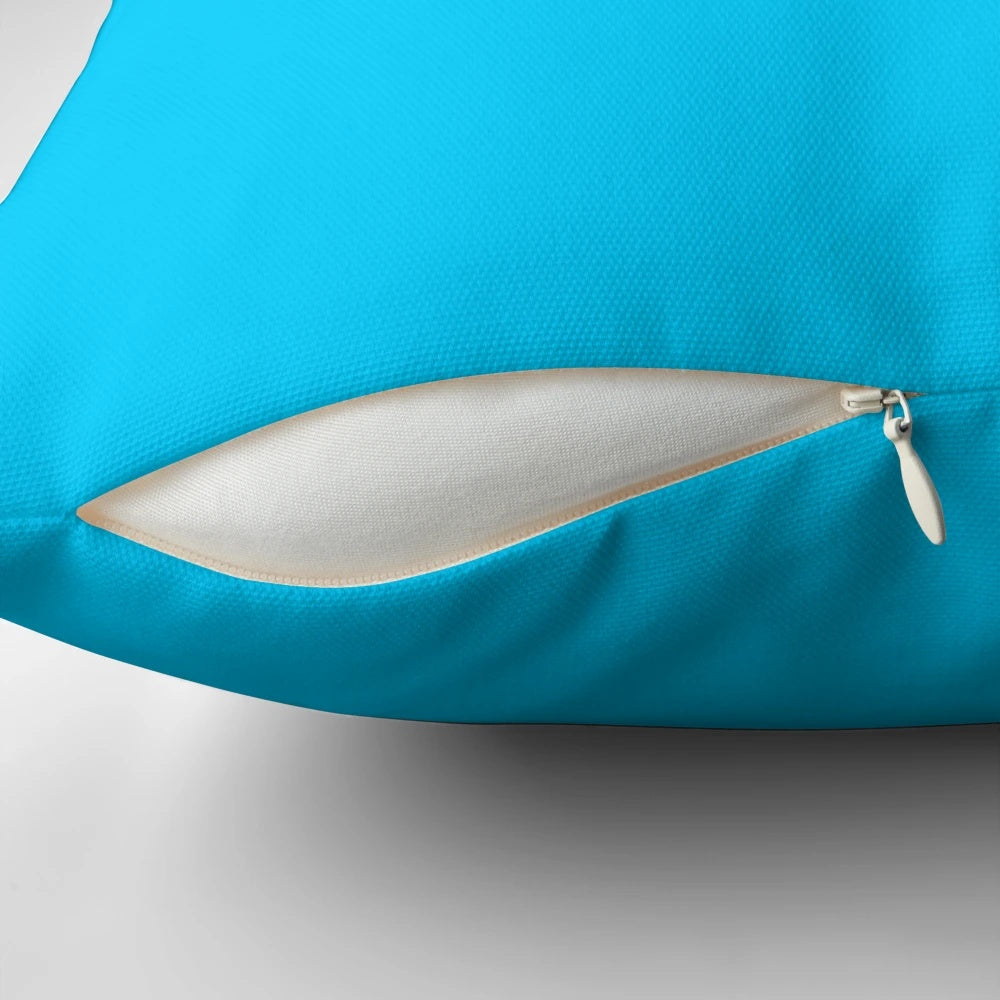 Solid blue decorative pillow with vivid, vibrant coloring