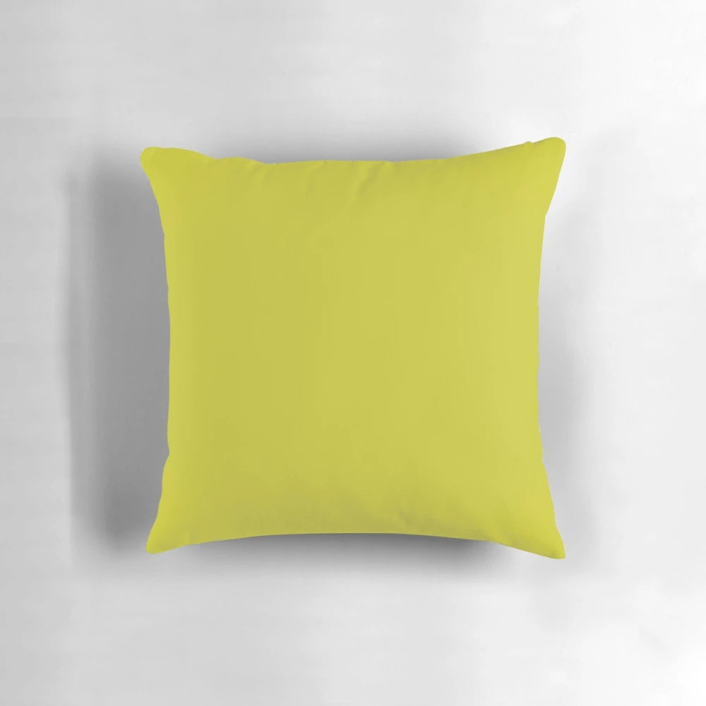Solid chartreuse green pillow, a vibrant and classic home decor accent.