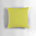 Solid chartreuse green pillow, a vibrant and classic home decor accent.