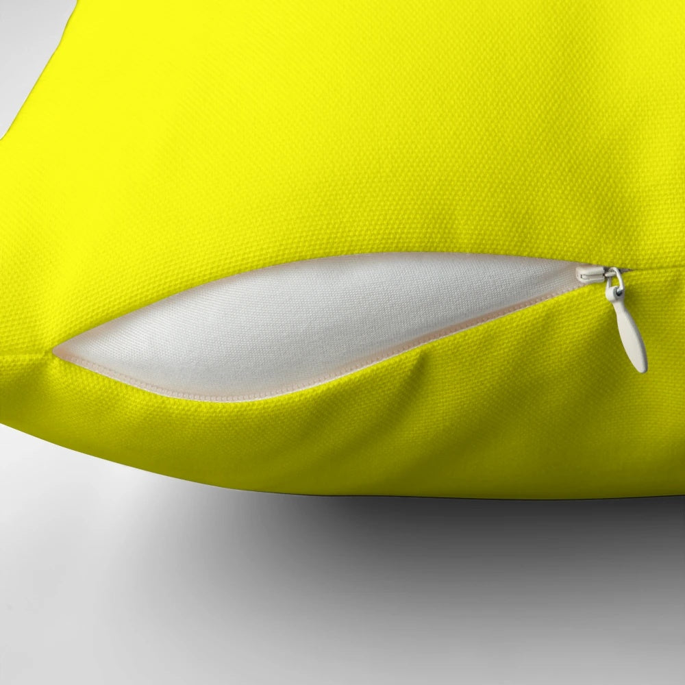 Bright and cheerful solid yellow throw pillow