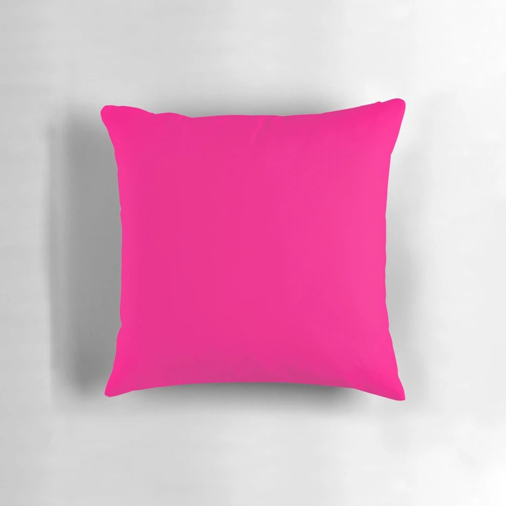 Bright pink decorative pillow with various shades of pink