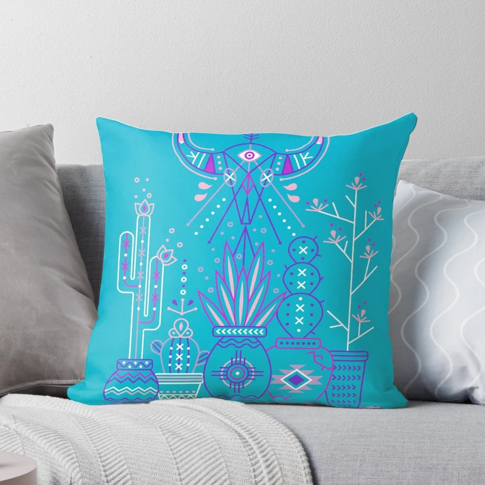 A vibrant blue and purple pillow featuring a southwestern-inspired cactus and succulent pattern, perfect for adding a touch of desert style to your home.