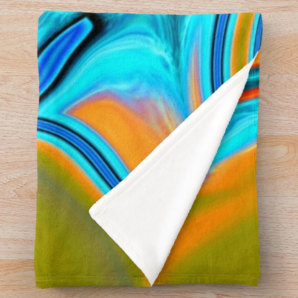 Plush blanket with vibrant turquoise and orange abstract swirl pattern