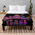 Colorful spiral frog design plush blanket with abstract geometric patterns