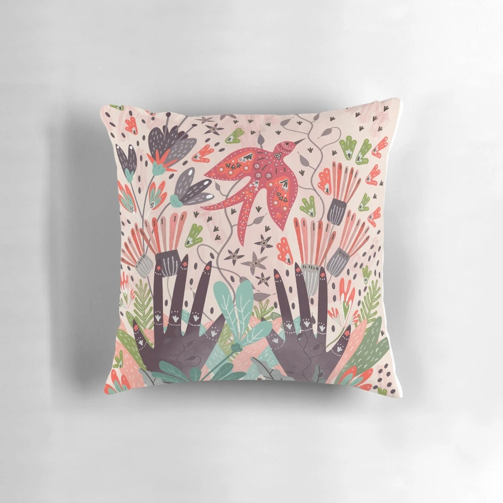 A beautiful decorative pillow featuring a charming bird design in a lush, nature-inspired color palette.