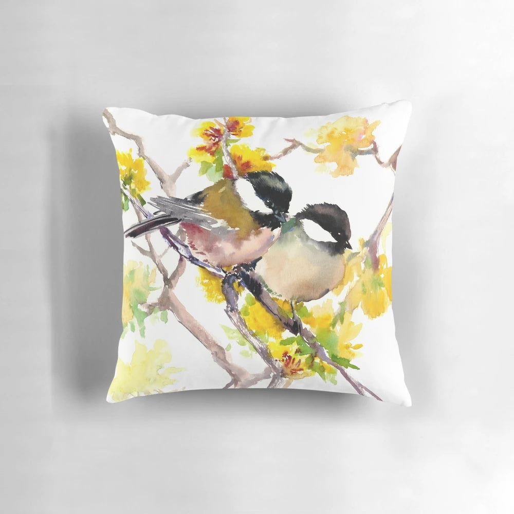 Beautiful pillow featuring a vibrant watercolor painting of spring birds, including a cute chickadee on a floral background.