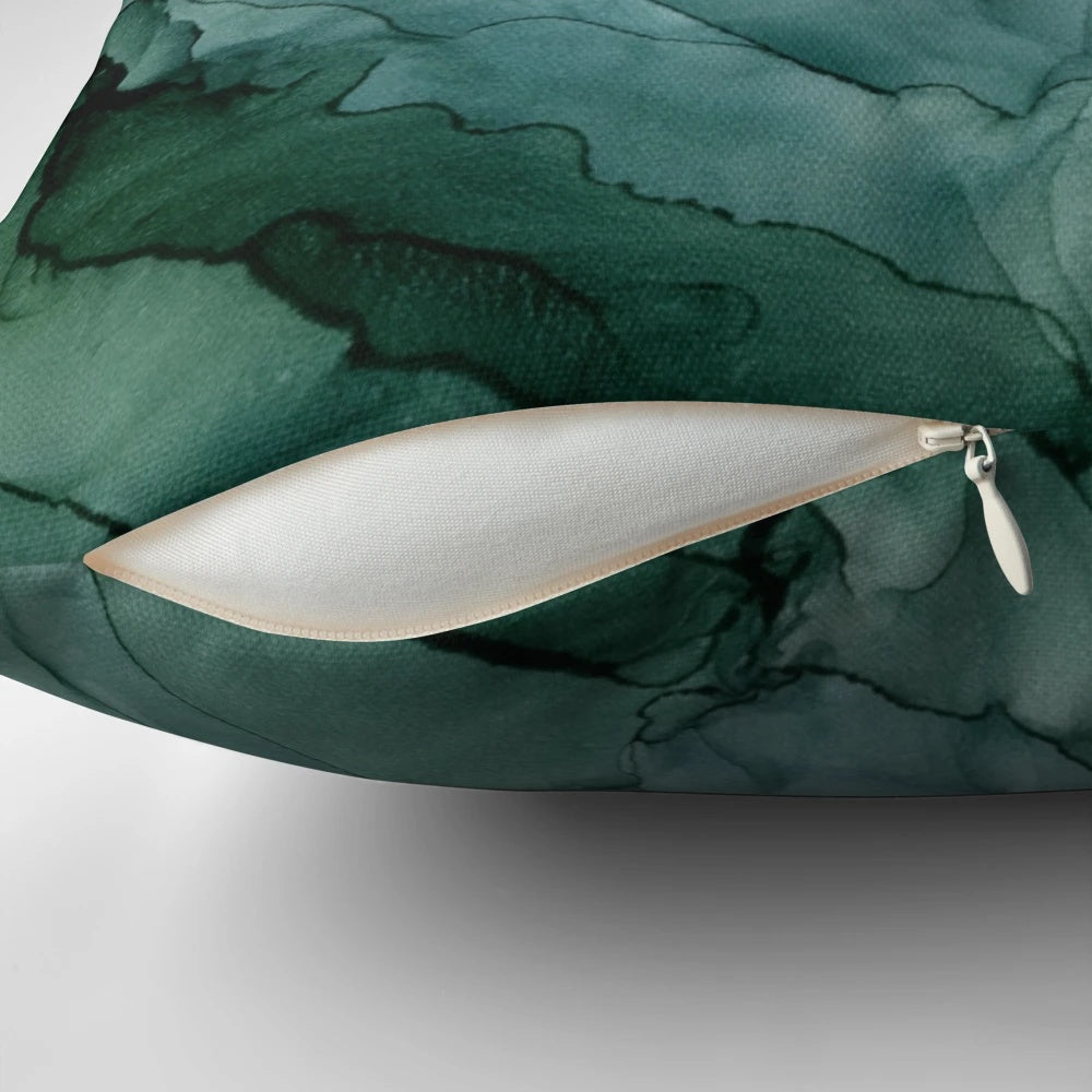 A colorful abstract floral painting showcased on a throw pillow for modern home decor.