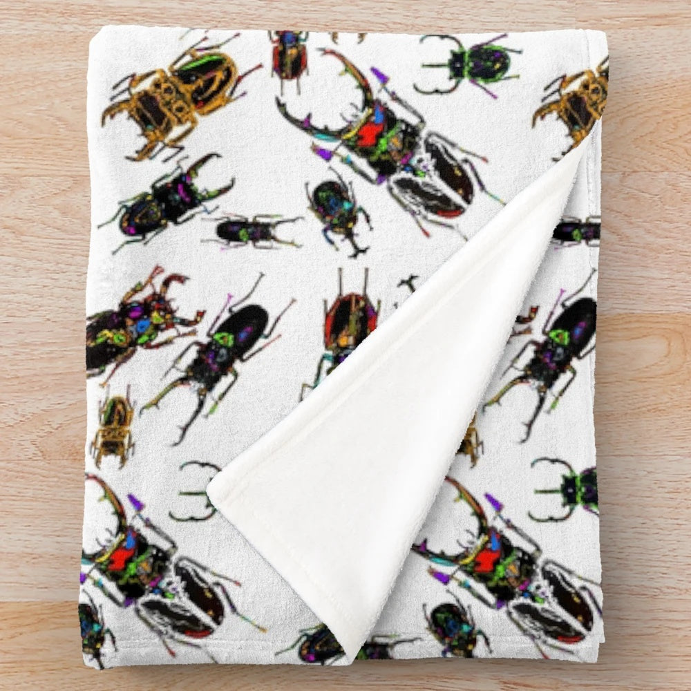 Stag beetle pattern plush blanket with bright, colorful design