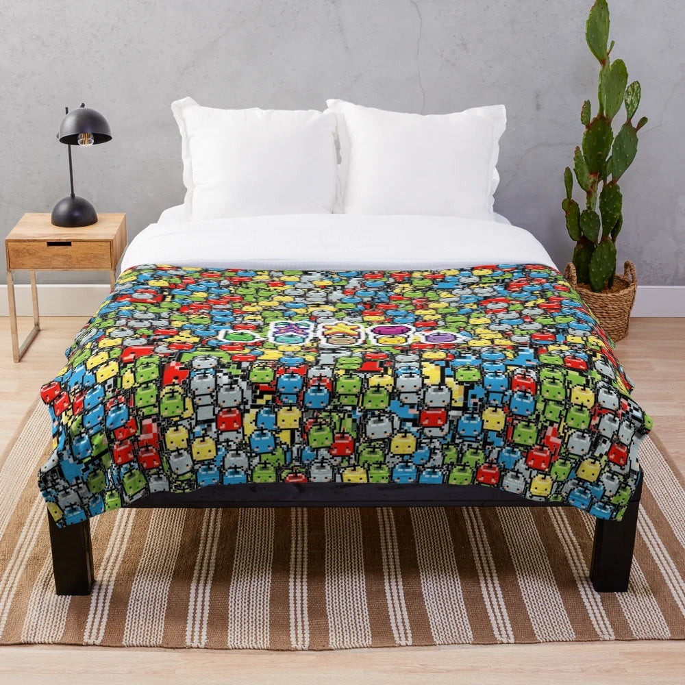 Stardew Valley inspired plush blanket with a colorful 8-bit junimo design