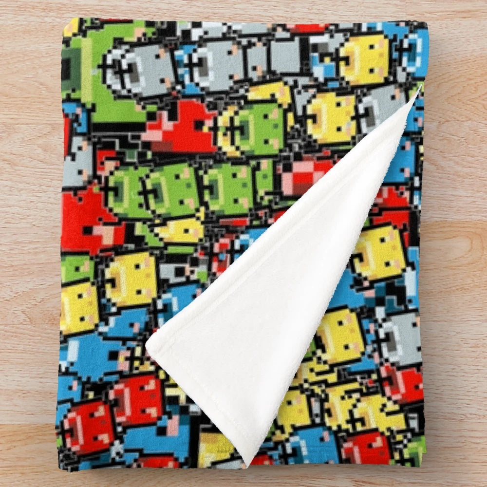 Stardew Valley inspired plush blanket with a colorful 8-bit junimo design