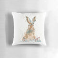 Vibrant watercolor painting of a startled hare on a decorative accent pillow.
