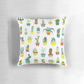 Colorful succulent pillow featuring a variety of desert plants and flowers