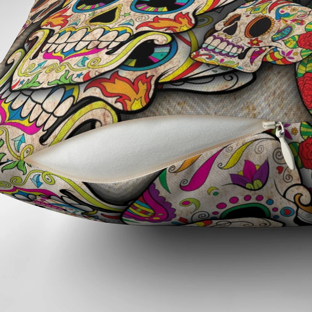 Colorful sugar skull collage design on a decorative throw pillow