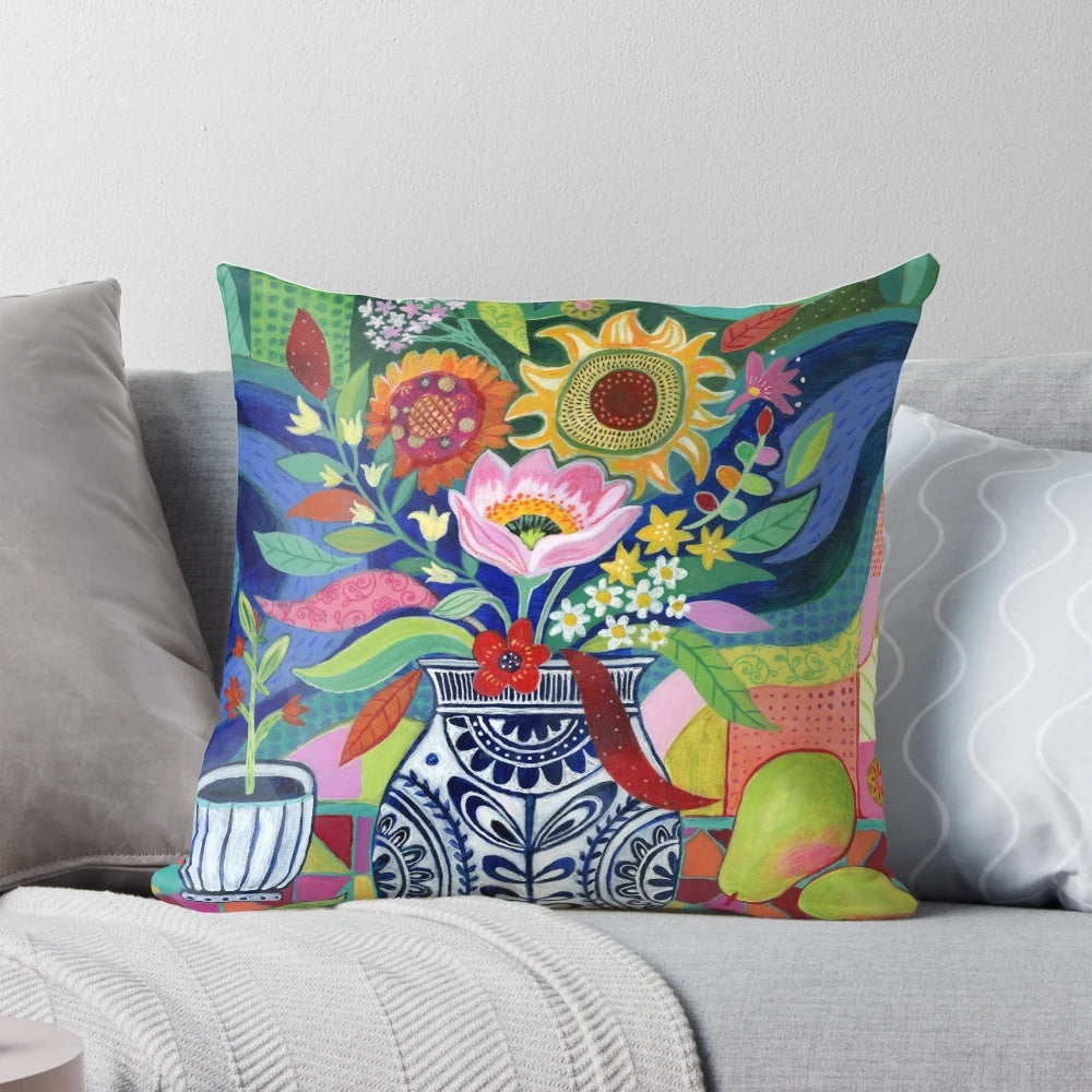Colorful floral still life decorative pillow featuring a vase of bright summer blooms