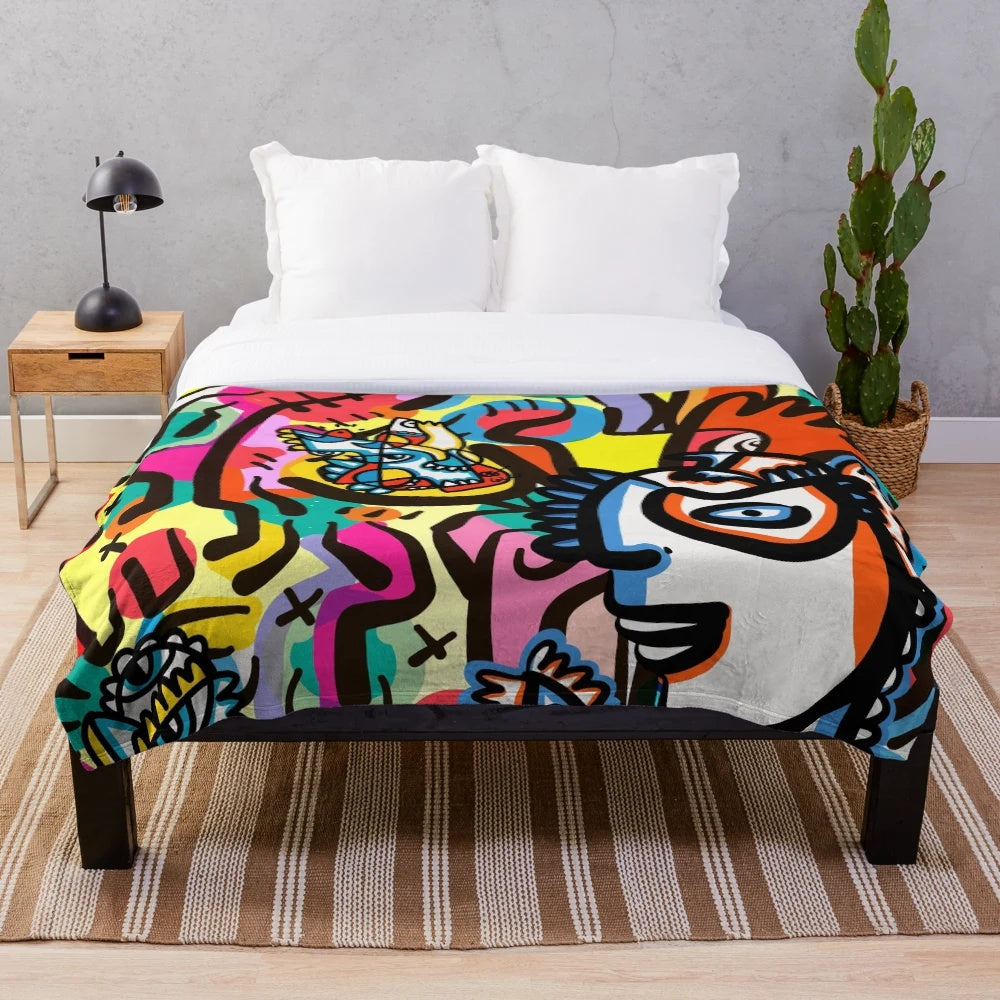 Colorful plush blanket with vibrant pop art patterns by artist Emmanuel Signorino