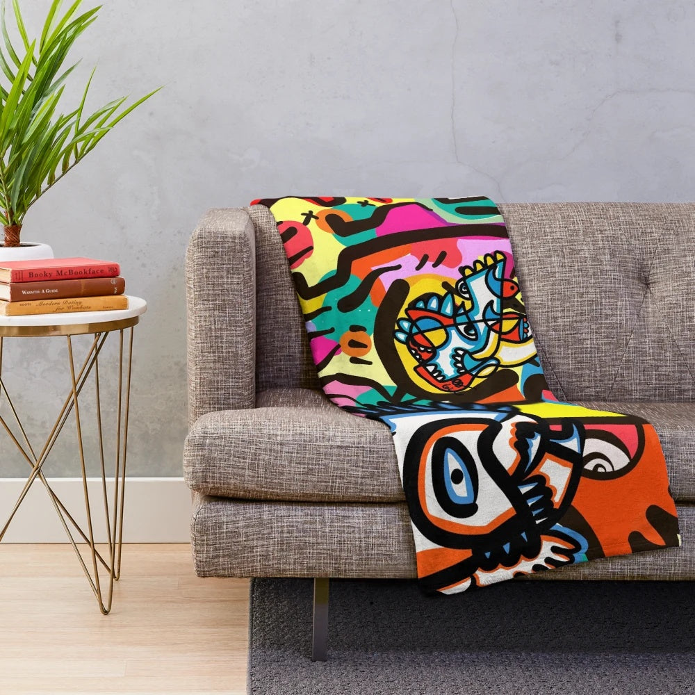 Colorful plush blanket with vibrant pop art patterns by artist Emmanuel Signorino