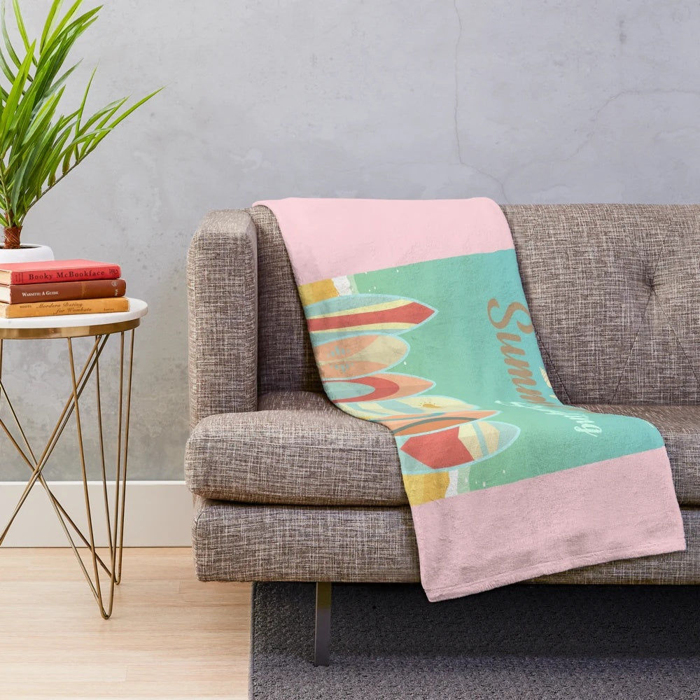 Plush blanket featuring a summer surfing scene with a blue ocean, sky, and surfboard