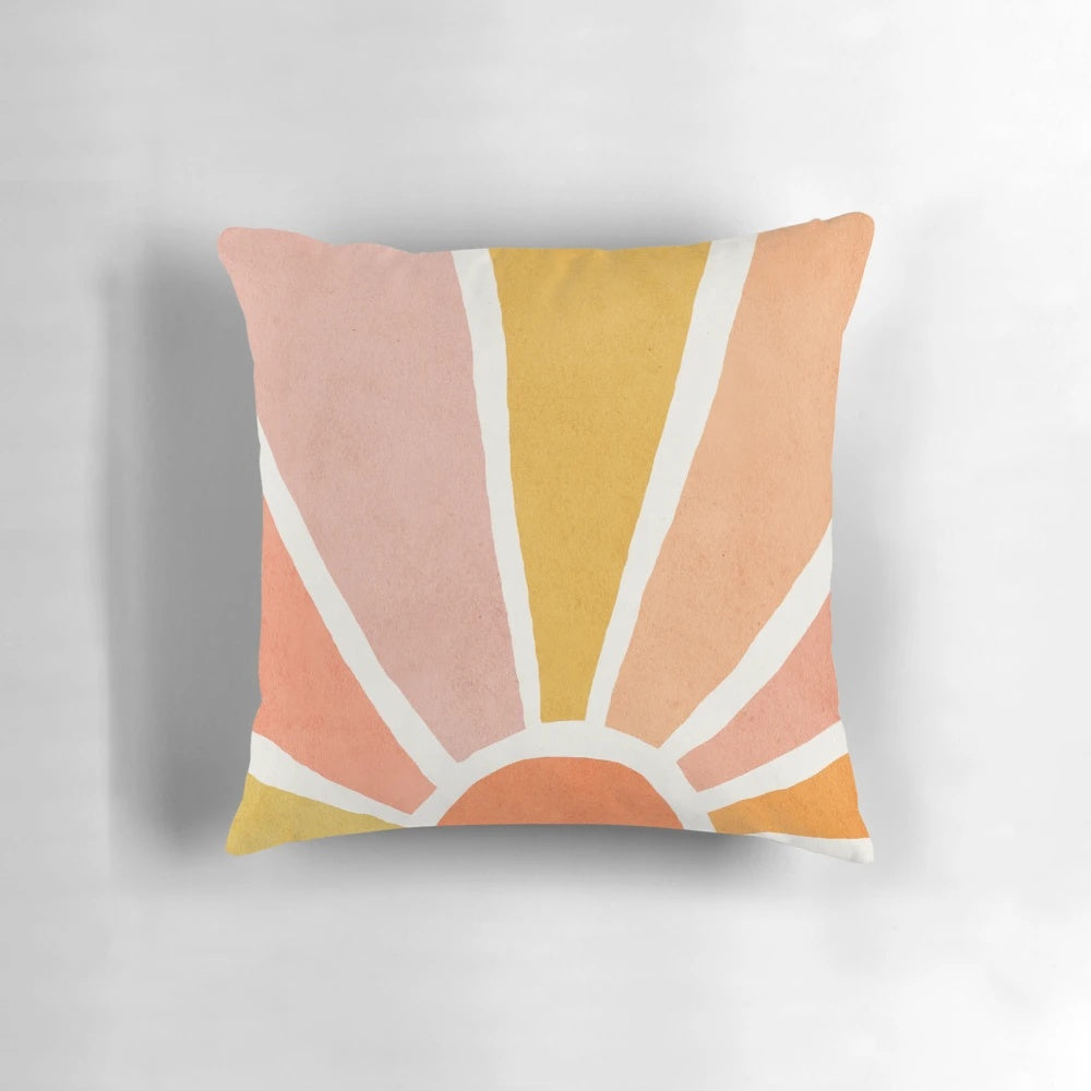 Colorful abstract sun wall art featuring vibrant red, orange, and yellow hues in a mid-century modern style, perfect for a nursery or children's room.