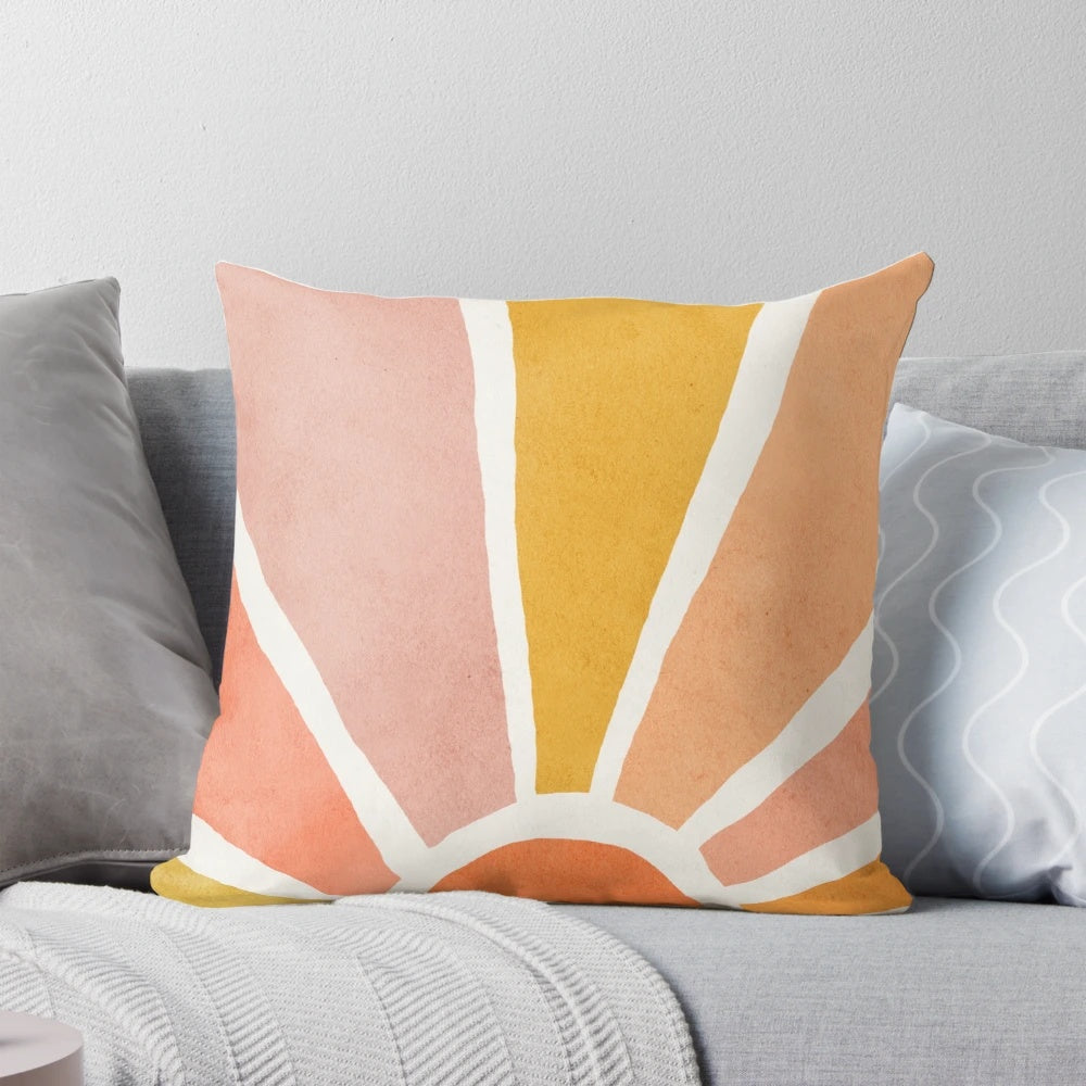 Colorful abstract sun wall art featuring vibrant red, orange, and yellow hues in a mid-century modern style, perfect for a nursery or children's room.