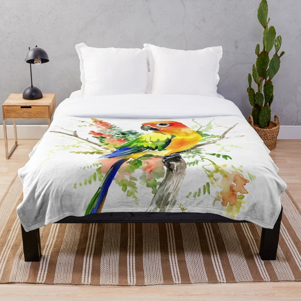 Soft and colorful plush blanket featuring a sun conure parakeet design