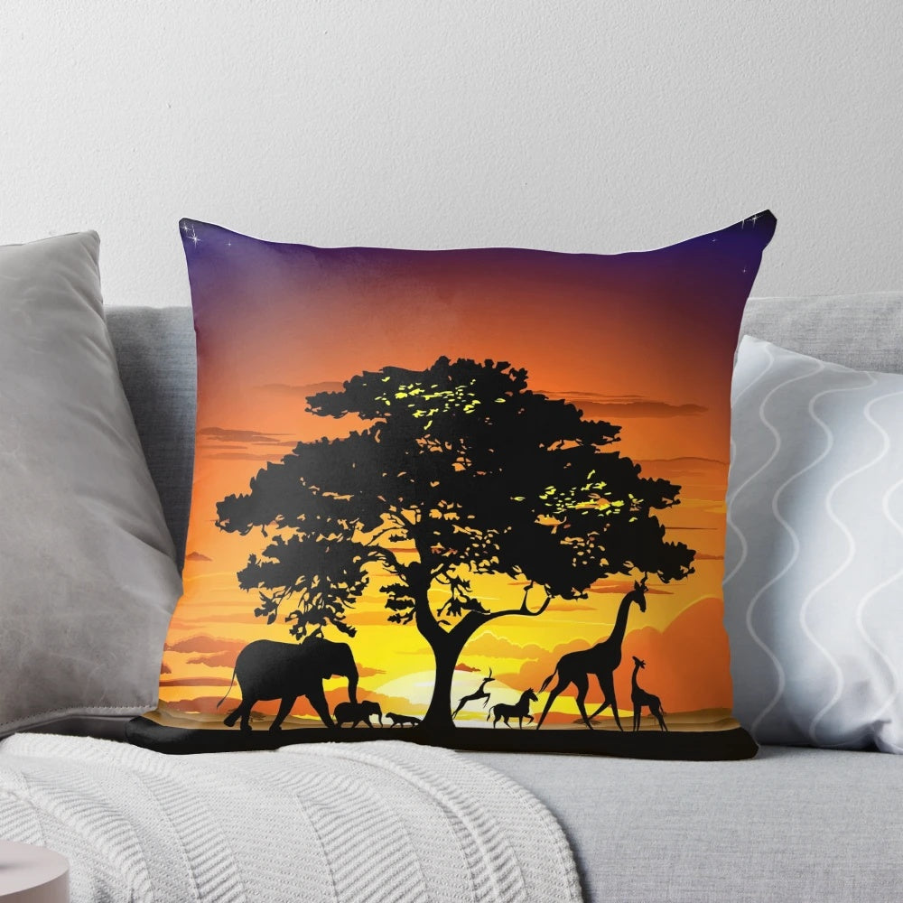 African savanna landscape at sunset with silhouetted wild animals