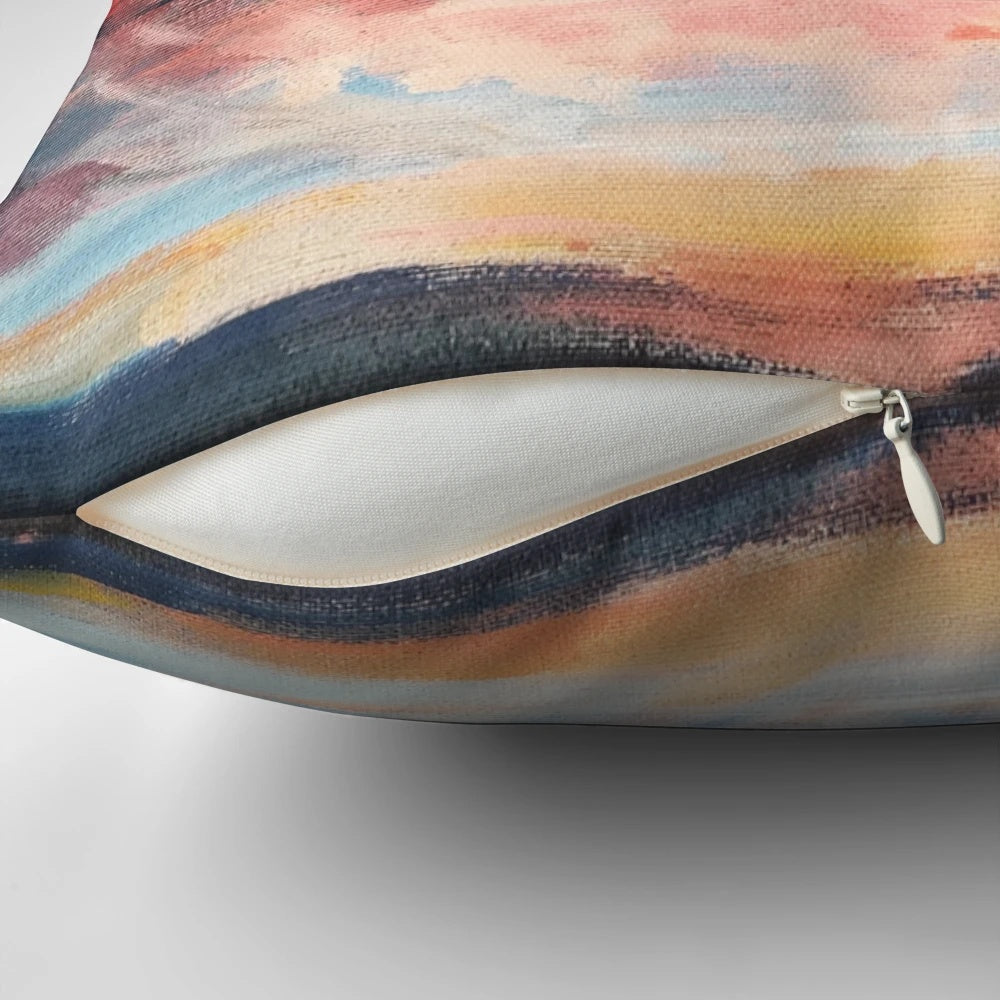 A beautiful throw pillow featuring a vibrant sunset seascape design with indigo, coral, and navy accents.