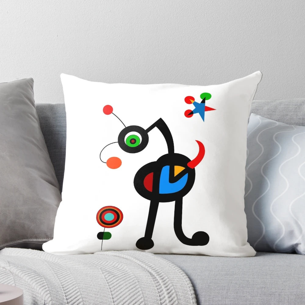 A vibrant, surreal-inspired throw pillow with abstract shapes and colors, inspired by the art of Joan Miro.