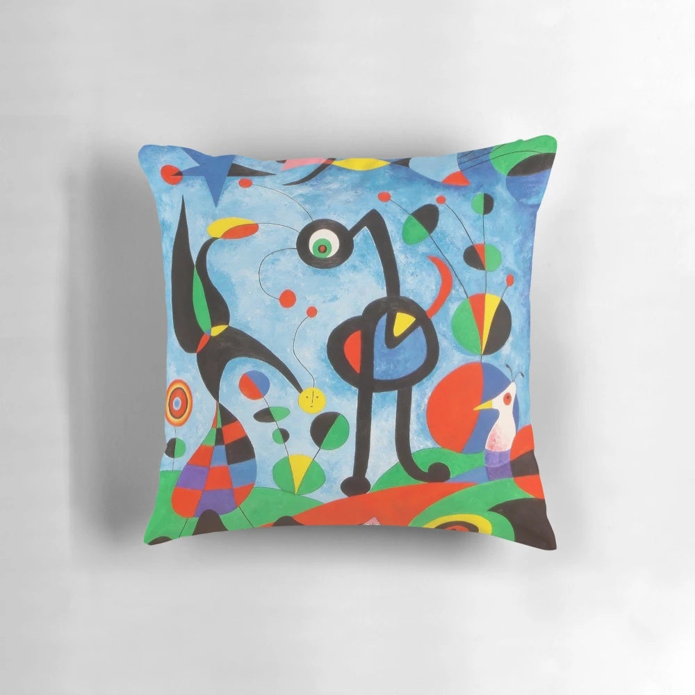 Colorful surrealist art pillow featuring the abstract designs of renowned Spanish artist Joan Miró