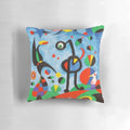 Colorful surrealist art pillow featuring the abstract designs of renowned Spanish artist Joan Miró