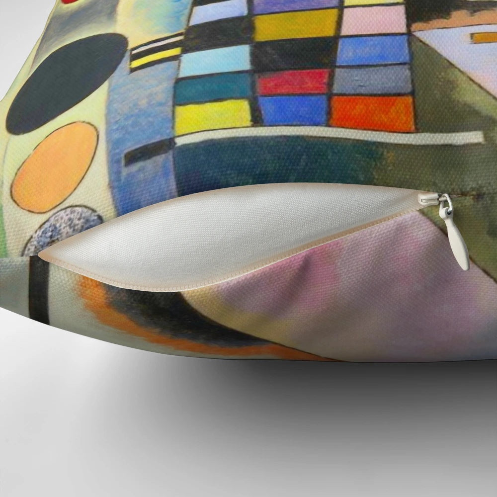 A colorful, abstract swinging pillow featuring geometric shapes and patterns in the style of Russian artist Wassily Kandinsky.