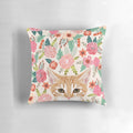 Decorative pillow featuring a vibrant floral pattern with a cute tabby cat central motif