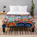 Colorful talavera tile design plush blanket with orange accents