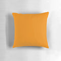 Vibrant tangerine-colored pillow with a solid, plain design, showcasing a range of orange hues.
