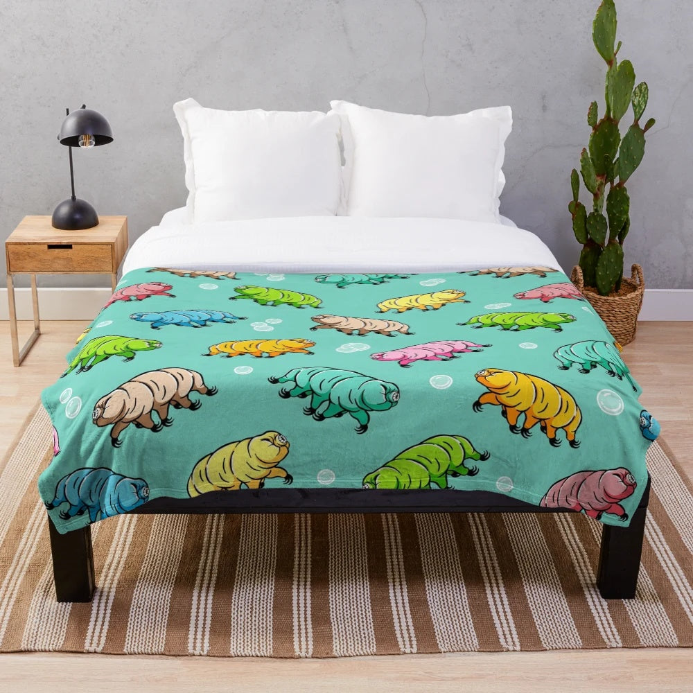 Colorful plush blanket with a tardigrade pattern design