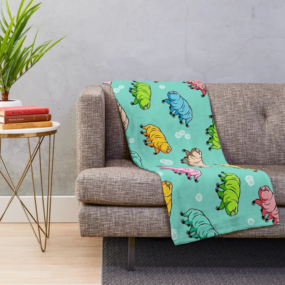 Colorful plush blanket with a tardigrade pattern design