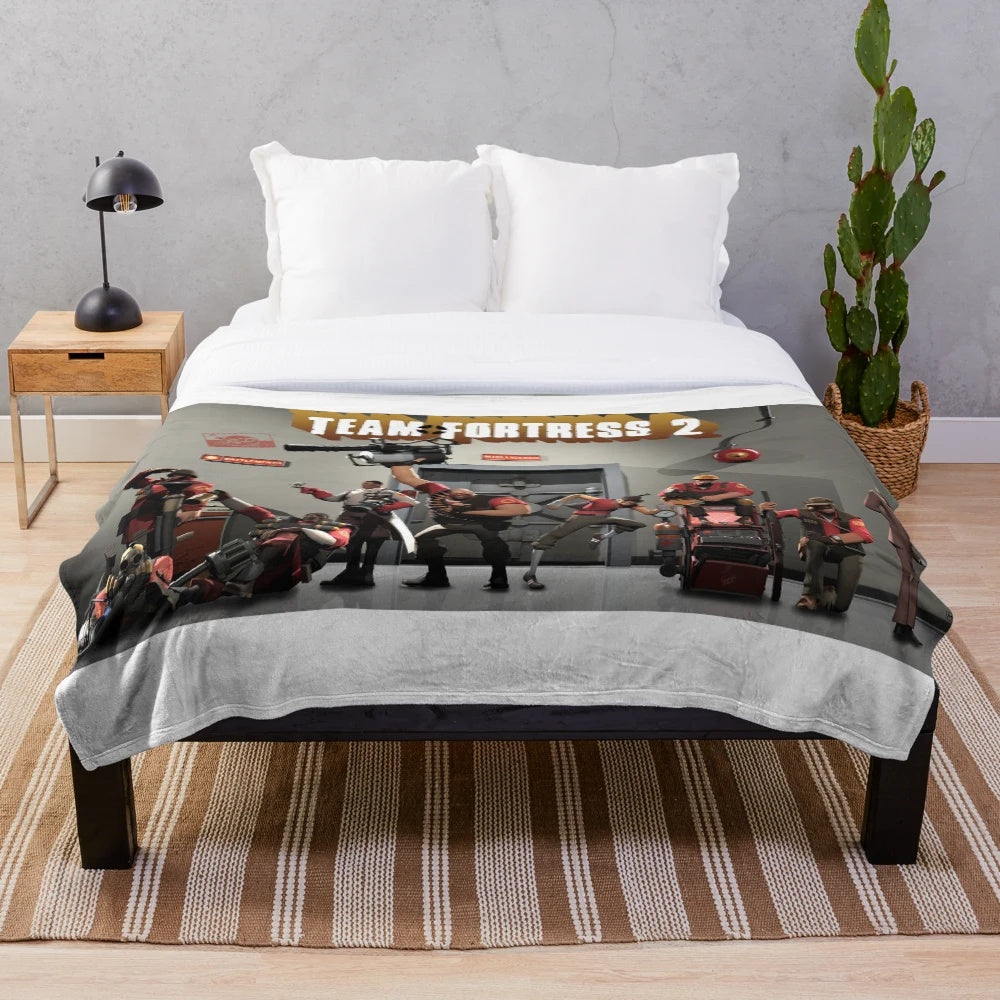 Team Fortress 2 inspired plush blanket featuring iconic game characters