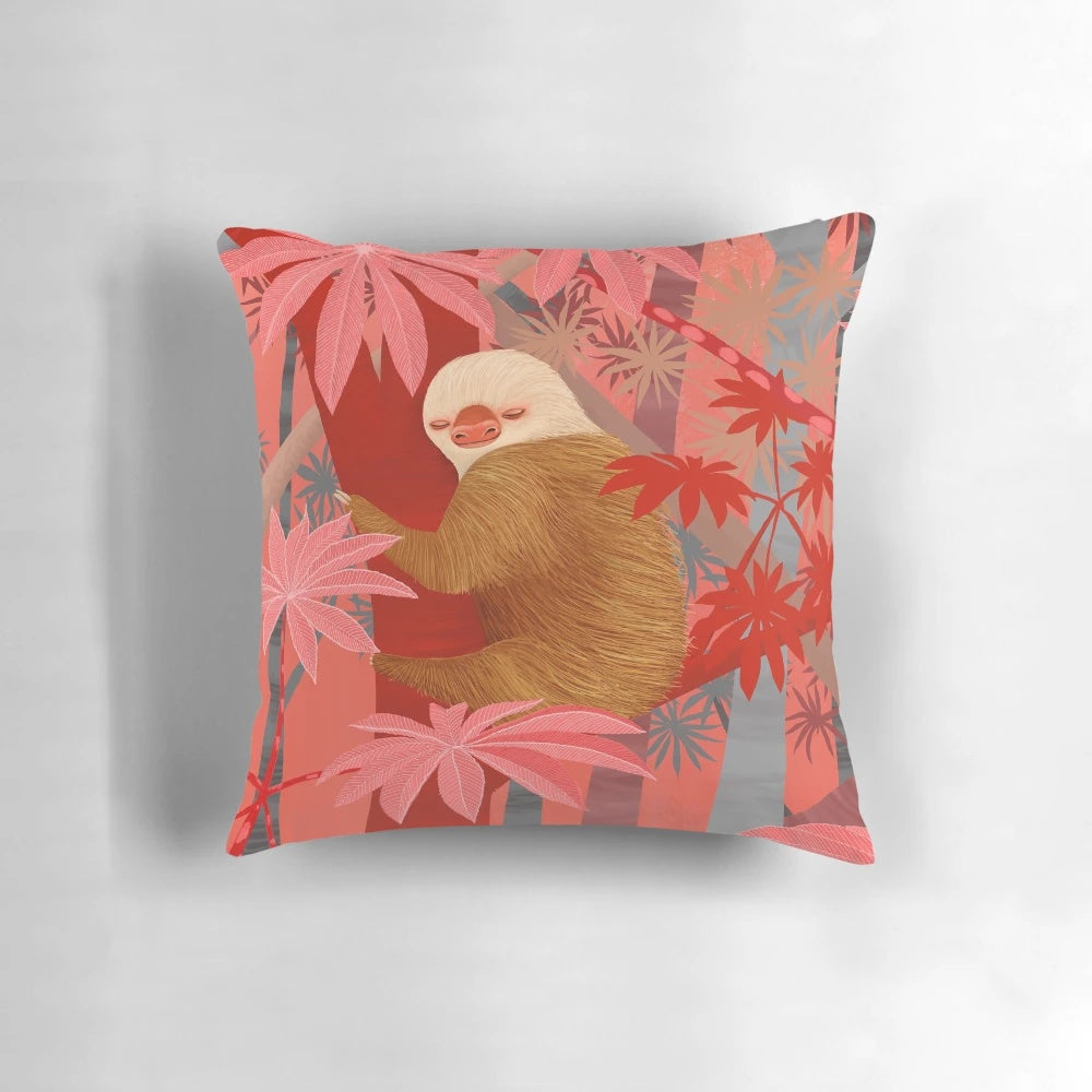 Colorful throw pillow featuring a vibrant jungle scene with sloths